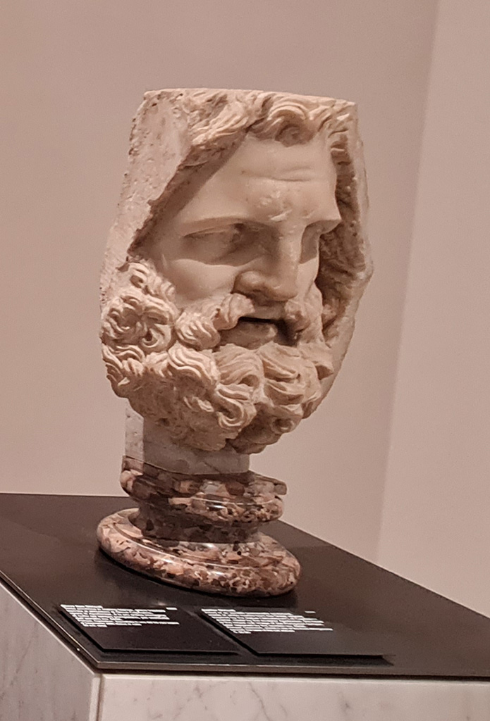 VII.8.1 Pompeii. White marble acrolithic bust of Jupiter. 
The head is the oldest cult image (c. 80 BC) of the Pompeian Temple, later replaced by the acrolith inventory number 6266.
It was stored in one of the three rooms beneath the base of the cult statues.
Now in Naples Archaeological Museum. Inventory number 6260.