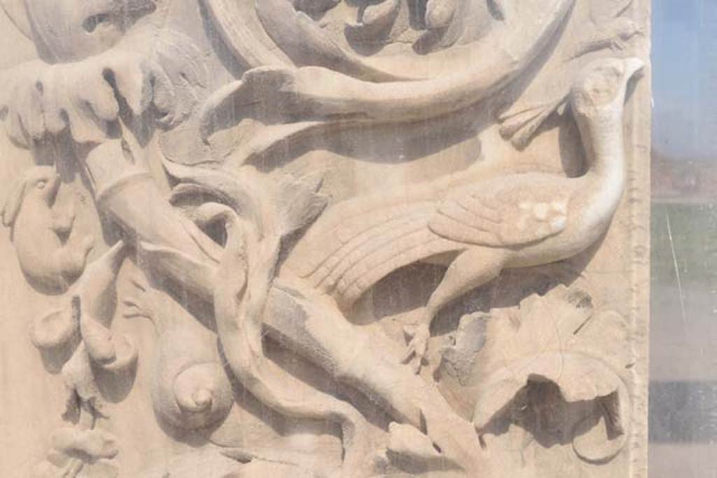 VII.9.1 Pompeii. April 2018. Detail of decoration from north side of doorway. Photo courtesy of Ian Lycett-King. 
Use is subject to Creative Commons Attribution-NonCommercial License v.4 International.