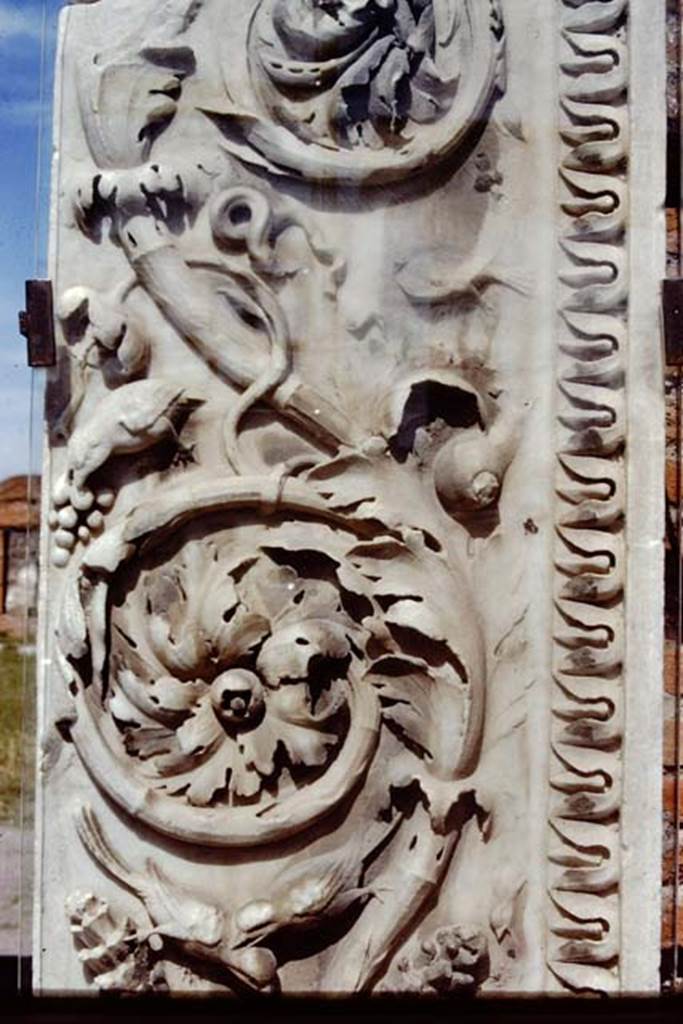 VII.9.1 Pompeii. 1991. Entrance decoration, south side of doorway, detail from photo above and below. 
Source: The Wilhelmina and Stanley A. Jashemski archive in the University of Maryland Library, Special Collections (See collection page) and made available under the Creative Commons Attribution-Non Commercial License v.4. See Licence and use details. J91f0003