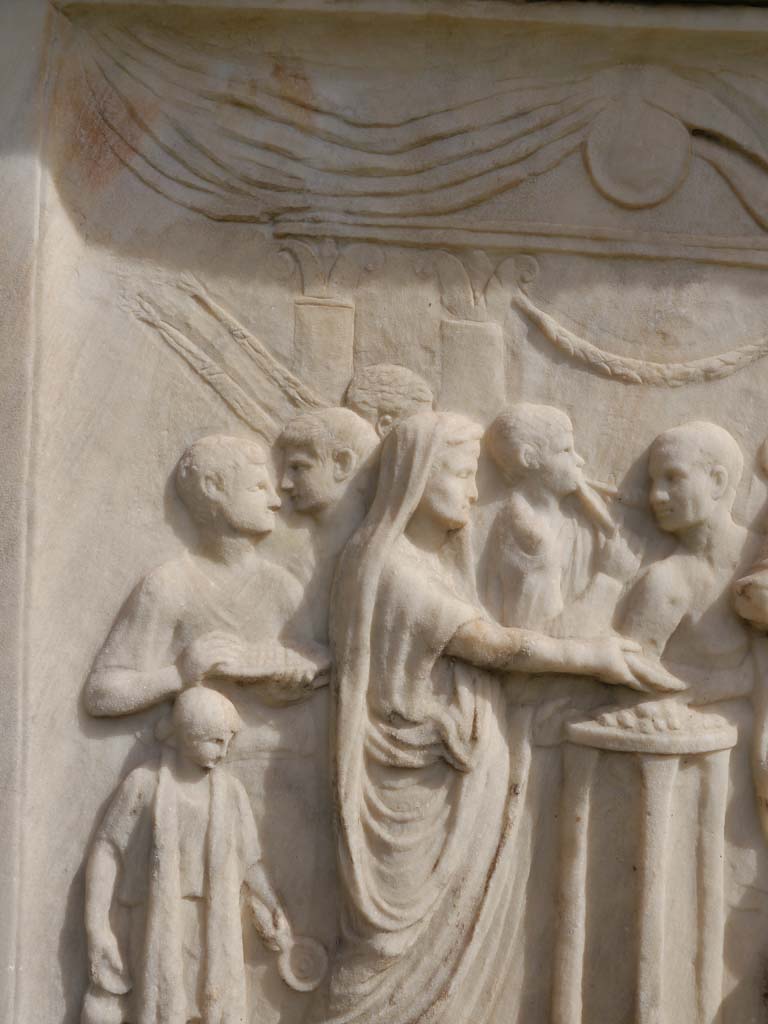 VII.9.2 Pompeii. March 2019. Detail of north end of west side of altar. 
Foto Anne Kleineberg, ERC Grant 681269 DÉCOR.