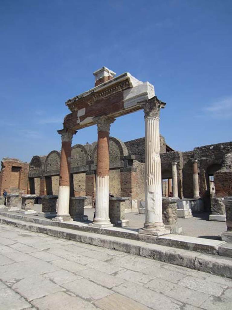 VII.9.7/8 Pompeii. March 2012. Entrances (on right) in north-east corner of Forum. Photo courtesy of Marina Fuxa.