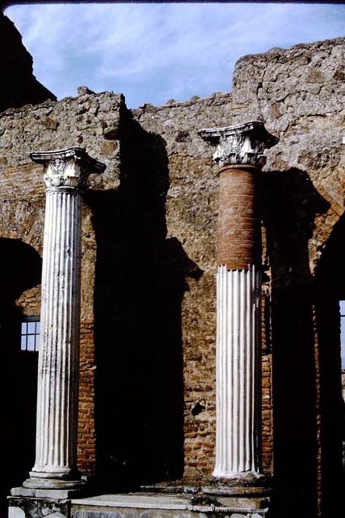 VII.9.7 Pompeii. 1964. Outside entrance to Macellum.  Photo by Stanley A. Jashemski.
Source: The Wilhelmina and Stanley A. Jashemski archive in the University of Maryland Library, Special Collections (See collection page) and made available under the Creative Commons Attribution-Non Commercial License v.4. See Licence and use details.
J64f1323