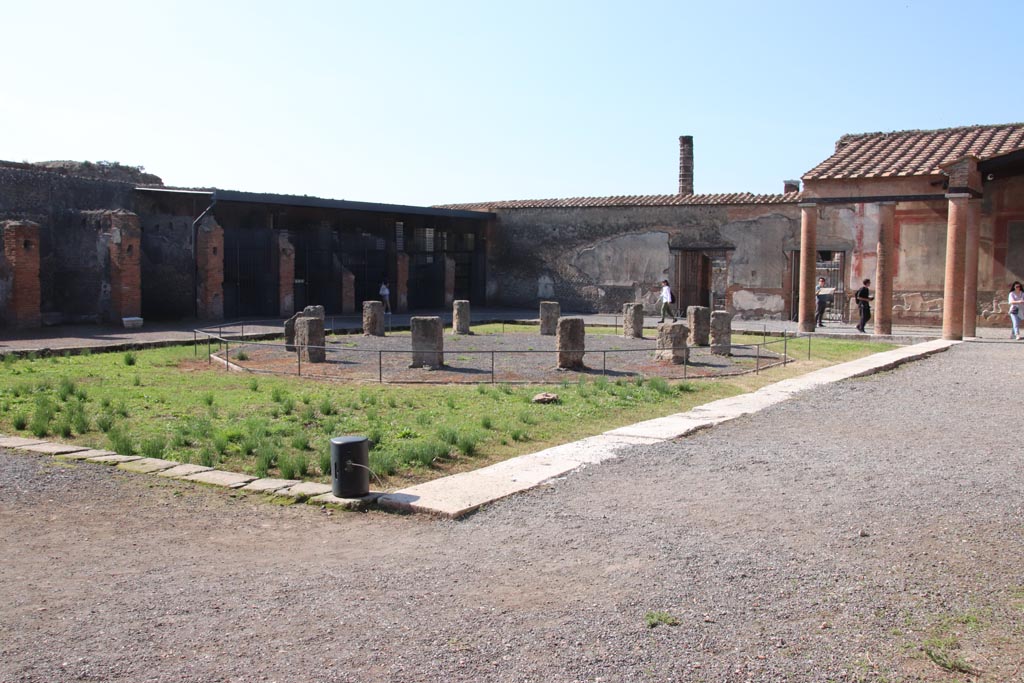 VII.9.7/8 Pompeii. October 2022. Looking towards south-west corner and west wall with entrance doorways. Photo courtesy of Klaus Heese.