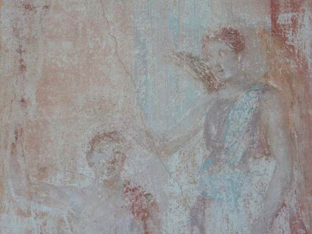 VII.9.7 and VII.9.8 Pompeii. Macellum. May 2015. North-west corner, detail of Victory crowning a warrior?  Photo courtesy of Buzz Ferebee.