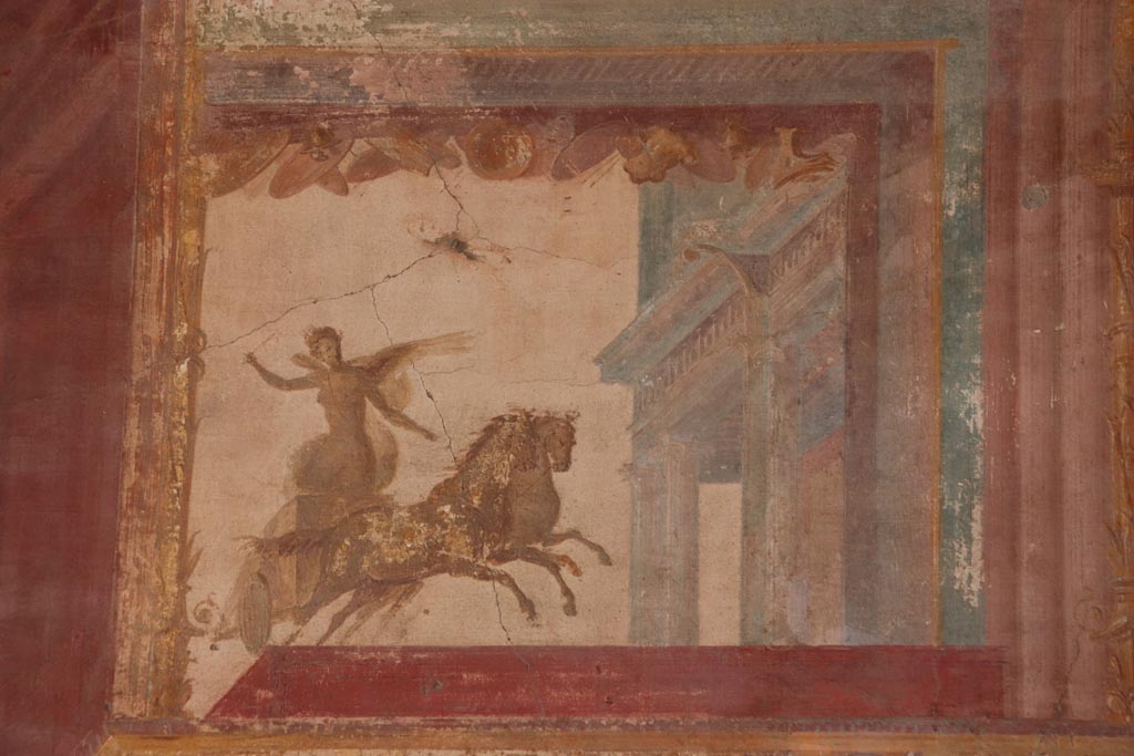 VII.9.7 and VII.9.8 Pompeii. October 2022.
Upper west wall in north-west corner, detail of architectural painting. Photo courtesy of Klaus Heese.
