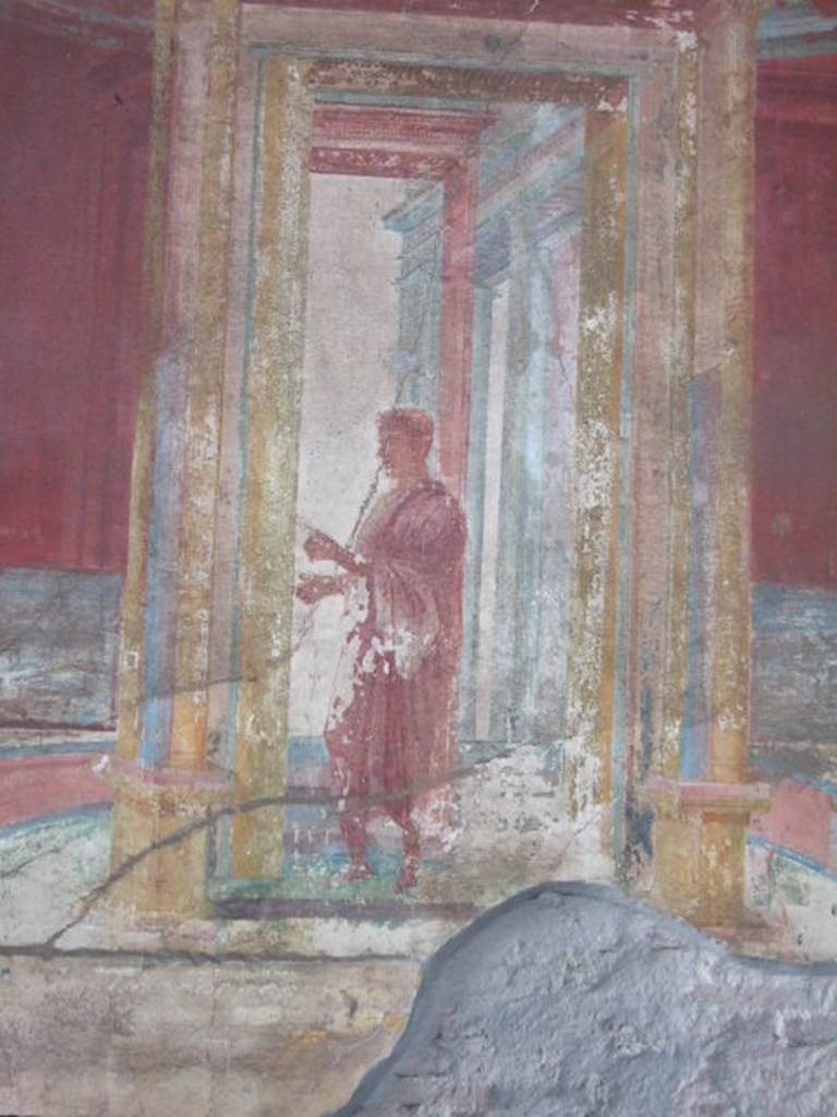 VII.9.7 and VII.9.8 Pompeii. Macellum. September 2005. North-west corner, detail of painting of figure in toga.