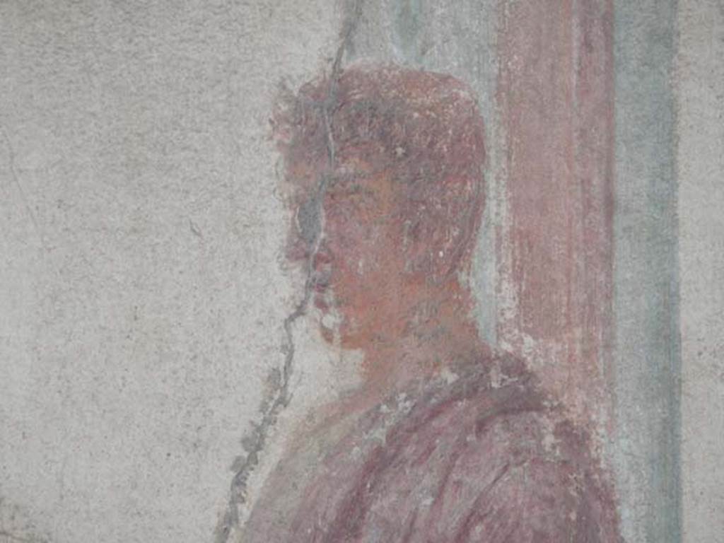 VII.9.7 and VII.9.8 Pompeii. Macellum. May 2015.  North-west corner, detail of painting of figure in toga. Photo courtesy of Buzz Ferebee.