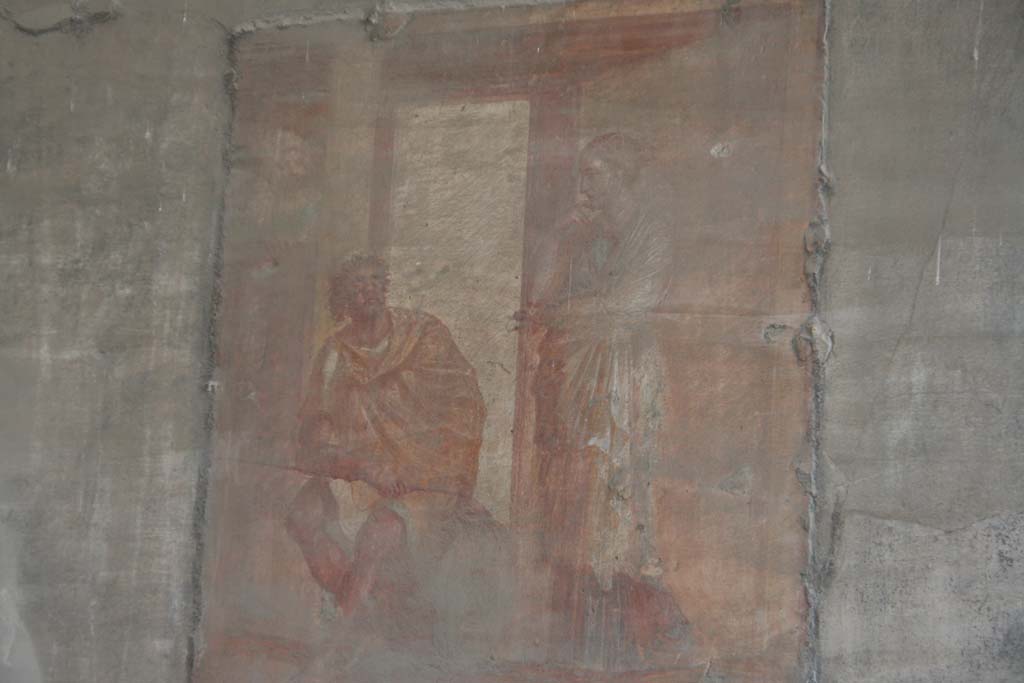 VII.9.7 and VII.9.8 Pompeii. Macellum. April 2011. North wall in north-west corner. 
Wall painting of Ulysses relating his adventures to Penelope. Photo courtesy of Klaus Heese.