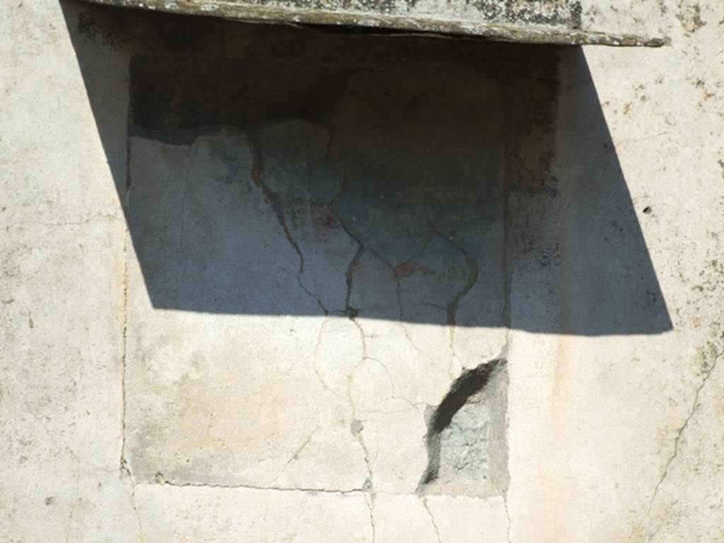 VII.9.7 and VII.9.8 Pompeii. Macellum. March 2009. North wall in north-east corner showing remains of wall painting.
According to PPM – on the east side of the north wall a trace of a wall painting of Phryxus was seen at the centre of a panel painted black with a wide red border.
See Carratelli, G. P., 1990-2003. Pompei: Pitture e Mosaici, VII. Roma: Istituto della enciclopedia italiana, p. 340.