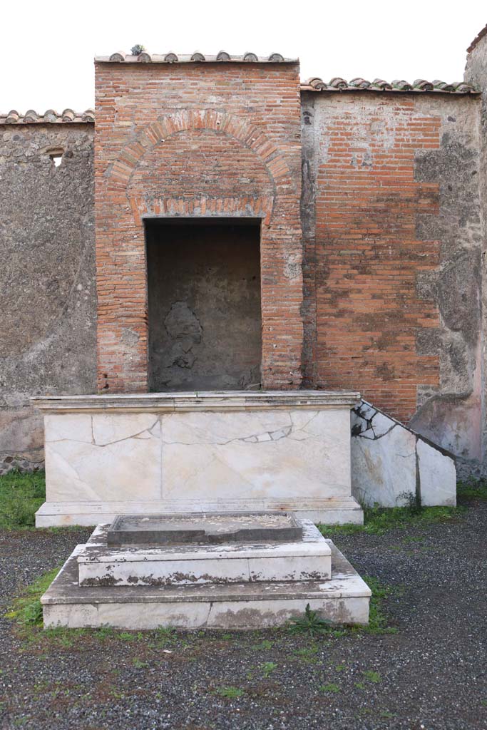 VII.9.7 and VII.9.8 Pompeii. Macellum. December 2018.  
Looking towards east wall with marble podium. Photo courtesy of Aude Durand.