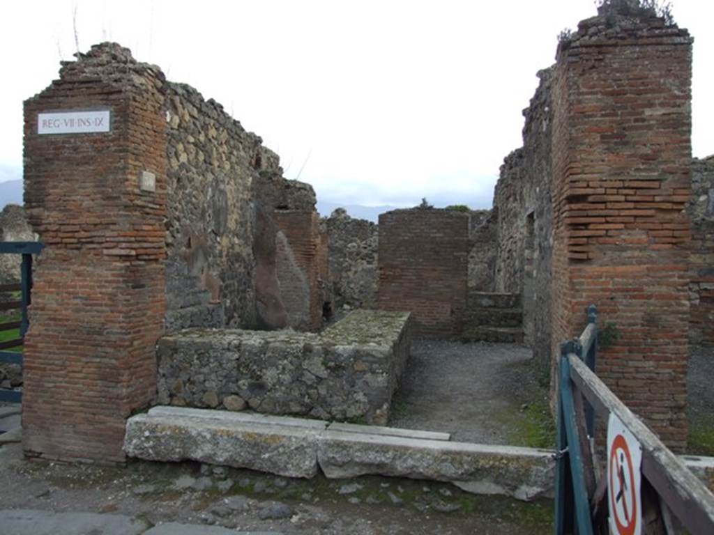 VII.9.30 Pompeii. December 2007. Entrance doorway. According to Boyce, perhaps at this taberna, might have been found on one pilaster a painting of Mercury. Found on the opposite pilaster was Bacchus leaning upon a square pilaster and pressing the juice from a bunch of grapes into a kantharos. The kantharos stood on the top of the square pilaster. His references were Helbig 25, PAH ii, 55 (July 7 1822), Museo Borbonico iii, pl.50, Gell, Pompeiana (1832), i, 191, ii,172. See Boyce G. K., 1937. Corpus of the Lararia of Pompeii. Rome: MAAR 14. (p.111, no.19)