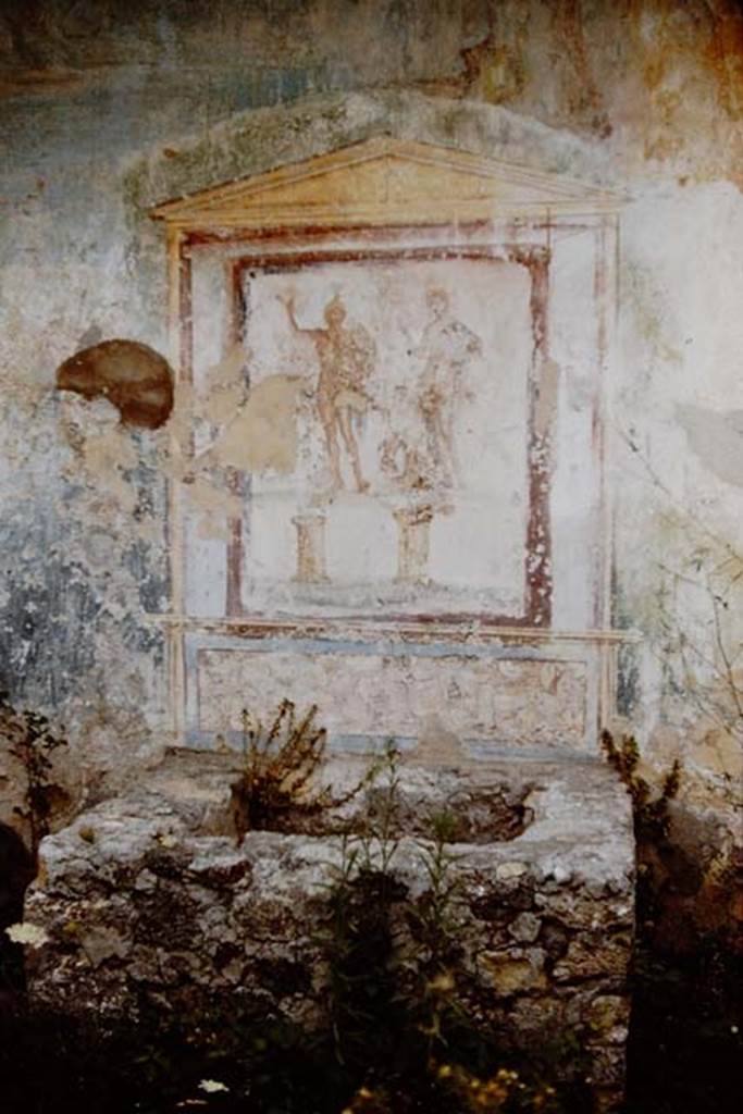 VII.9.33 Pompeii. 1959. Lararium painting on west wall and masonry basin below. Photo by Stanley A. Jashemski.
Source: The Wilhelmina and Stanley A. Jashemski archive in the University of Maryland Library, Special Collections (See collection page) and made available under the Creative Commons Attribution-Non Commercial License v.4. See Licence and use details.
J59f0402