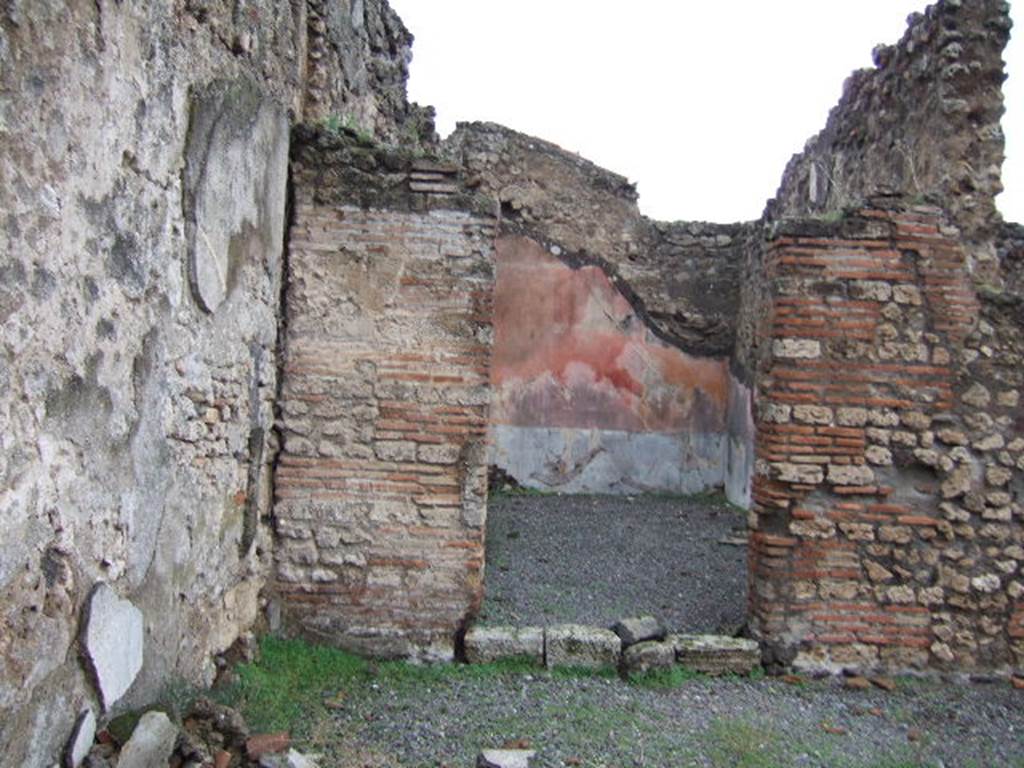 VII.9.38 Pompeii. December 2005. Looking towards doorway to triclinium, in north-west corner of atrium.  According to Helbig, a painting of Danae was found in the triclinium.
See Helbig, W., 1868. Wandgemälde der vom Vesuv verschütteten Städte Campaniens. Leipzig: Breitkopf und Härtel. (120)