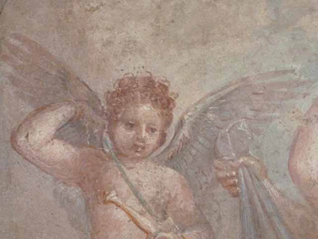 VII.9.47 Pompeii.  Room 6, west wall of tablinum.  Detail showing one of the cupids playing with the sword of Mars. Now in Naples Archaeological Museum. Inventory number: 9248.