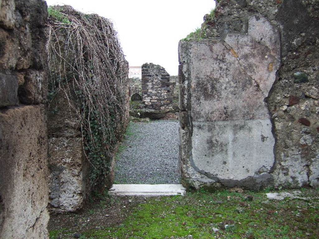 VII.9.47 Pompeii.  December 2005. Room 14.  Doorway to Kitchen area.