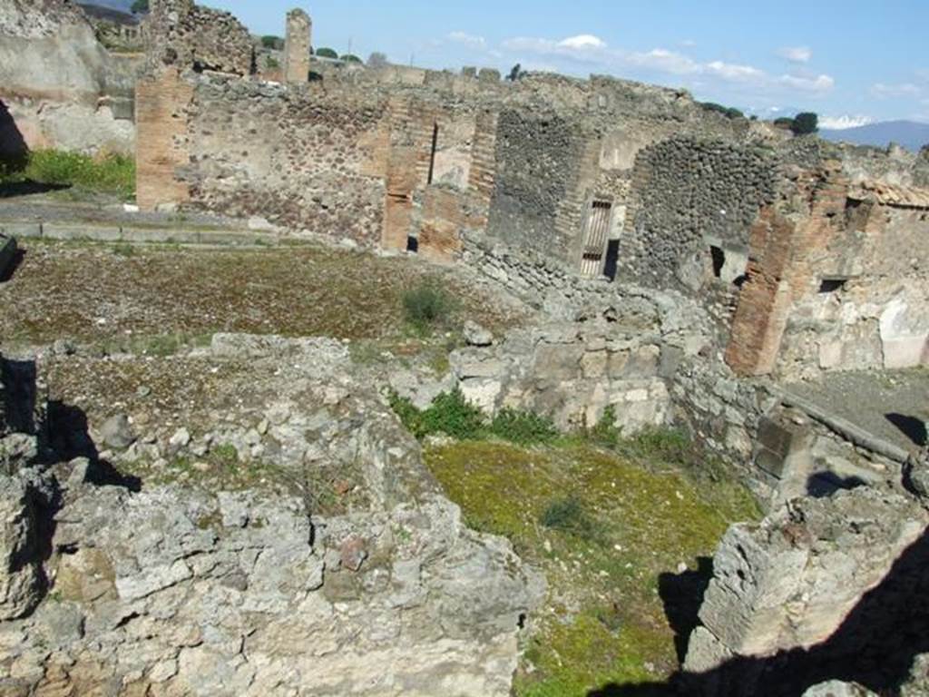 VII.9.60 Pompeii. March 2009. Looking north from top of Eumachia’s Building.   VII.9.61/62 is in the lower right hand corner.