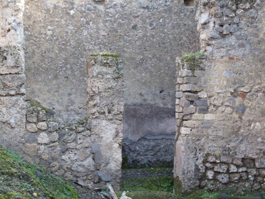VII.11.2 Pompeii. December 2007. Entrance to kitchen and latrine at rear of dwelling.
