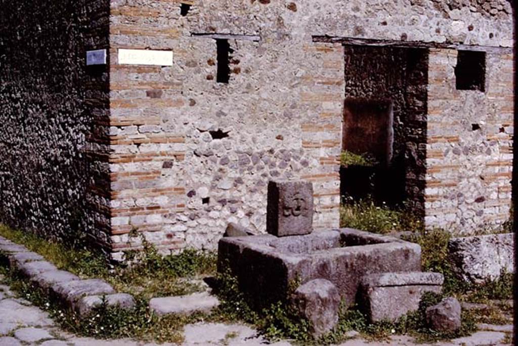 VII.11.5 Pompeii, 1978. Looking south-east to doorway on corner of Vicolo del Balcone Pensile (on left) and Vicolo della Maschera (on right). Photo by Stanley A. Jashemski.   
Source: The Wilhelmina and Stanley A. Jashemski archive in the University of Maryland Library, Special Collections (See collection page) and made available under the Creative Commons Attribution-Non Commercial License v.4. See Licence and use details. J78f0100