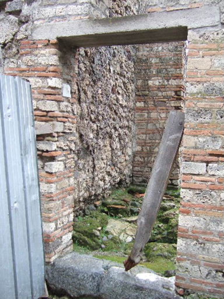 VII.11.8 Pompeii. December 2005. Entrance doorway to steps to upper floor.