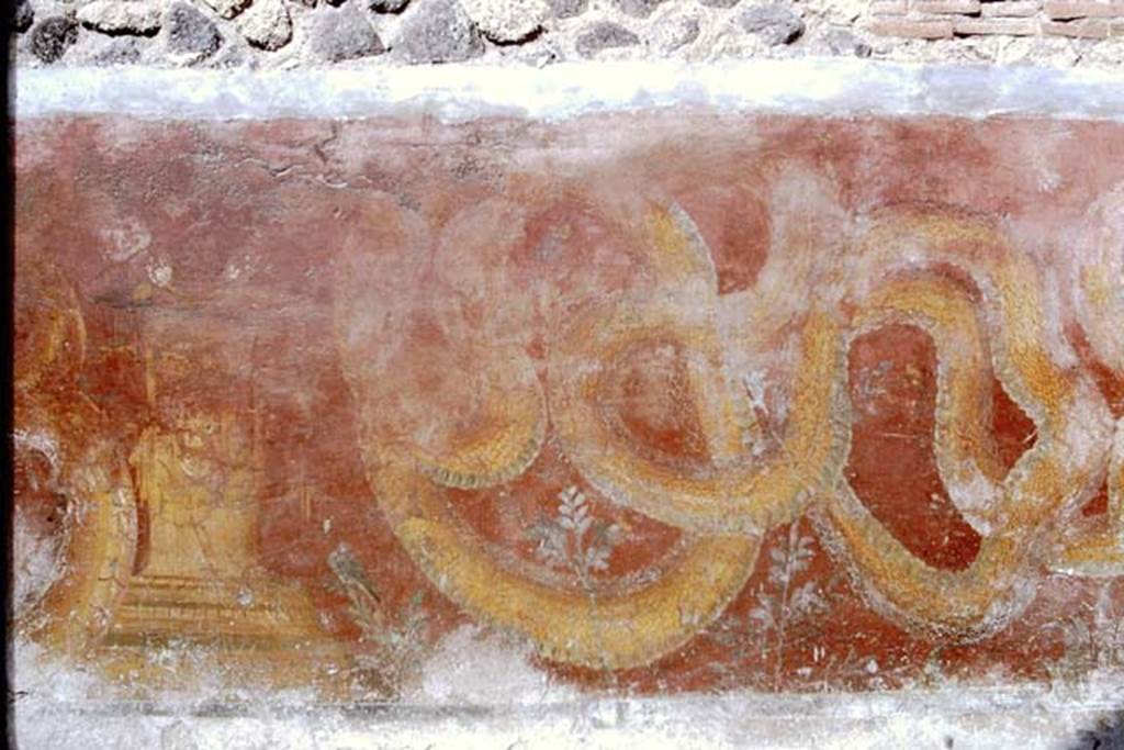 VII.11.13 Pompeii. 1966. Detail of painted altar on street shrine.  Photo by Stanley A. Jashemski.
Source: The Wilhelmina and Stanley A. Jashemski archive in the University of Maryland Library, Special Collections (See collection page) and made available under the Creative Commons Attribution-Non Commercial License v.4. See Licence and use details.
J66f0379