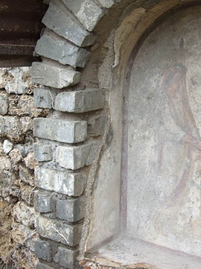 VII.11.14 Pompeii. March 2009. Garden “C”, painting of Genius on lararium.