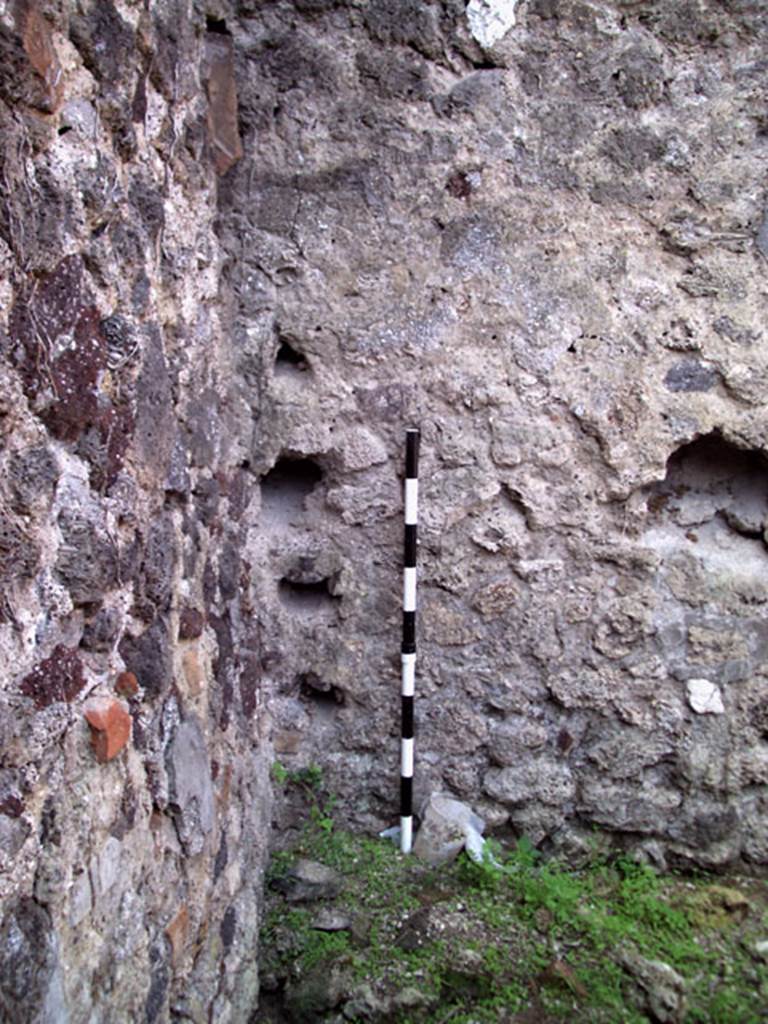 VII.12.11 Pompeii. July 2008. North-west corner of room on west side of oven. Photo courtesy of Jared Benton.