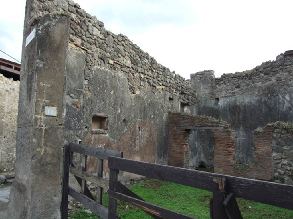 VII.12.14 Pompeii. December 2007. East wall with niche. According to Boyce, in the east wall of the shop-room was a rectangular niche. Its inside walls were coated with orange-coloured stucco.   See Boyce G. K., 1937. Corpus of the Lararia of Pompeii. Rome: MAAR 14. (p.71, no.319)
