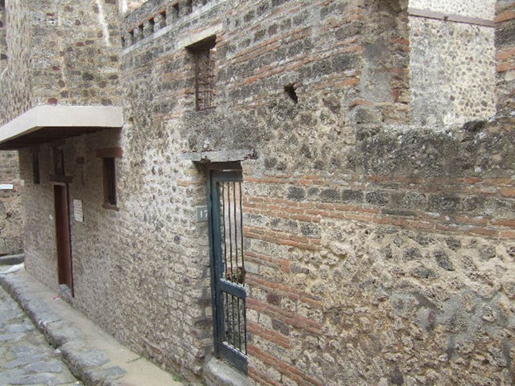 VII.12.18 and VII.12.17 Pompeii. May 2006.  
Entrances on Vicolo del Lupanare. Looking south-east.