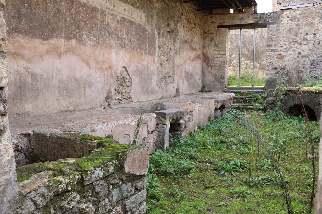 VII.12.17, Pompeii. December 2018. 
Looking west from entrance doorway, towards a doorway into VII.12.21. Photo courtesy of Aude Durand.