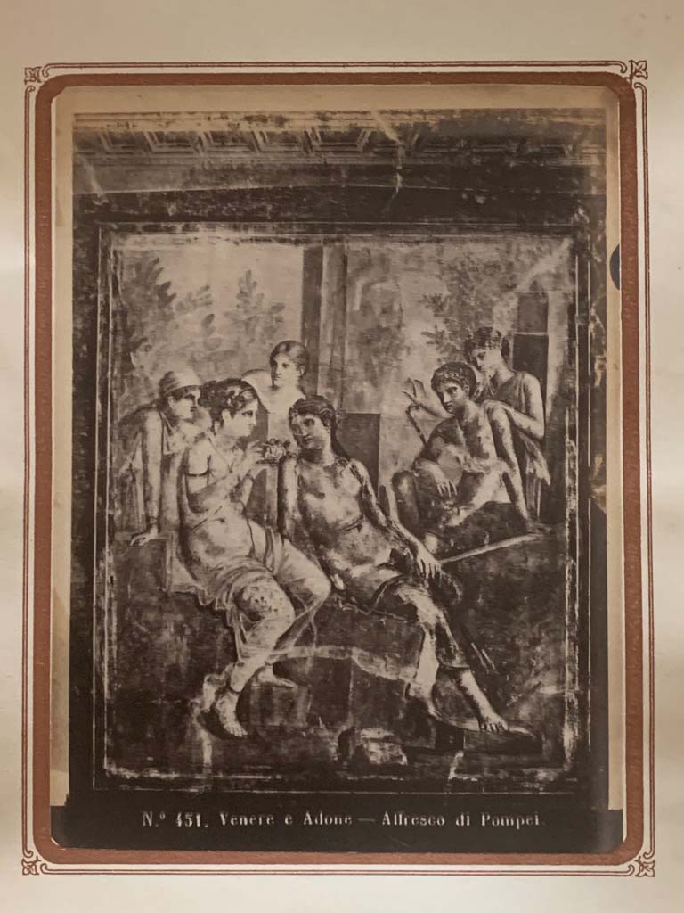 VII.12.26 Pompeii. From an album by Roberto Rive dated 1868. 
Room 12, detail of painting of Venus giving some Cupids to Adonis, from centre of north wall.
This would seem to show the painting MANN 111437 but still in situ.
Photo courtesy of Rick Bauer. 
A similar painting can be found in situ in VI.8.3/5.