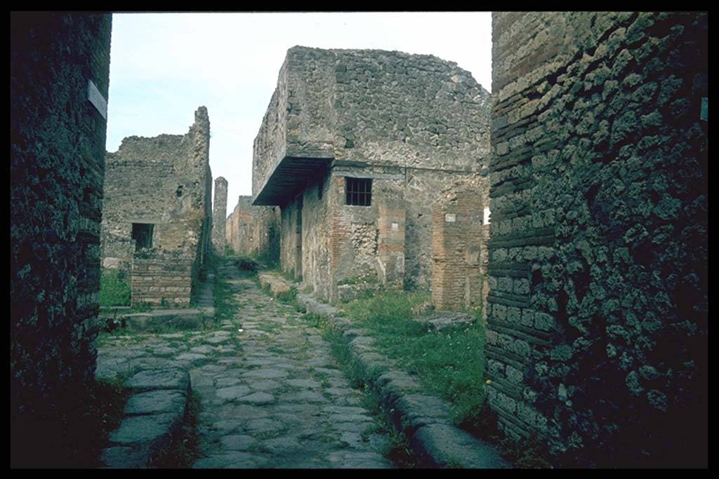 VII.12.28 Pompeii. Looking west to the junction of Vicolo del Balcone Pensile with Vicolo della Maschera, on the left. 
Photographed 1970-79 by Günther Einhorn, picture courtesy of his son Ralf Einhorn.