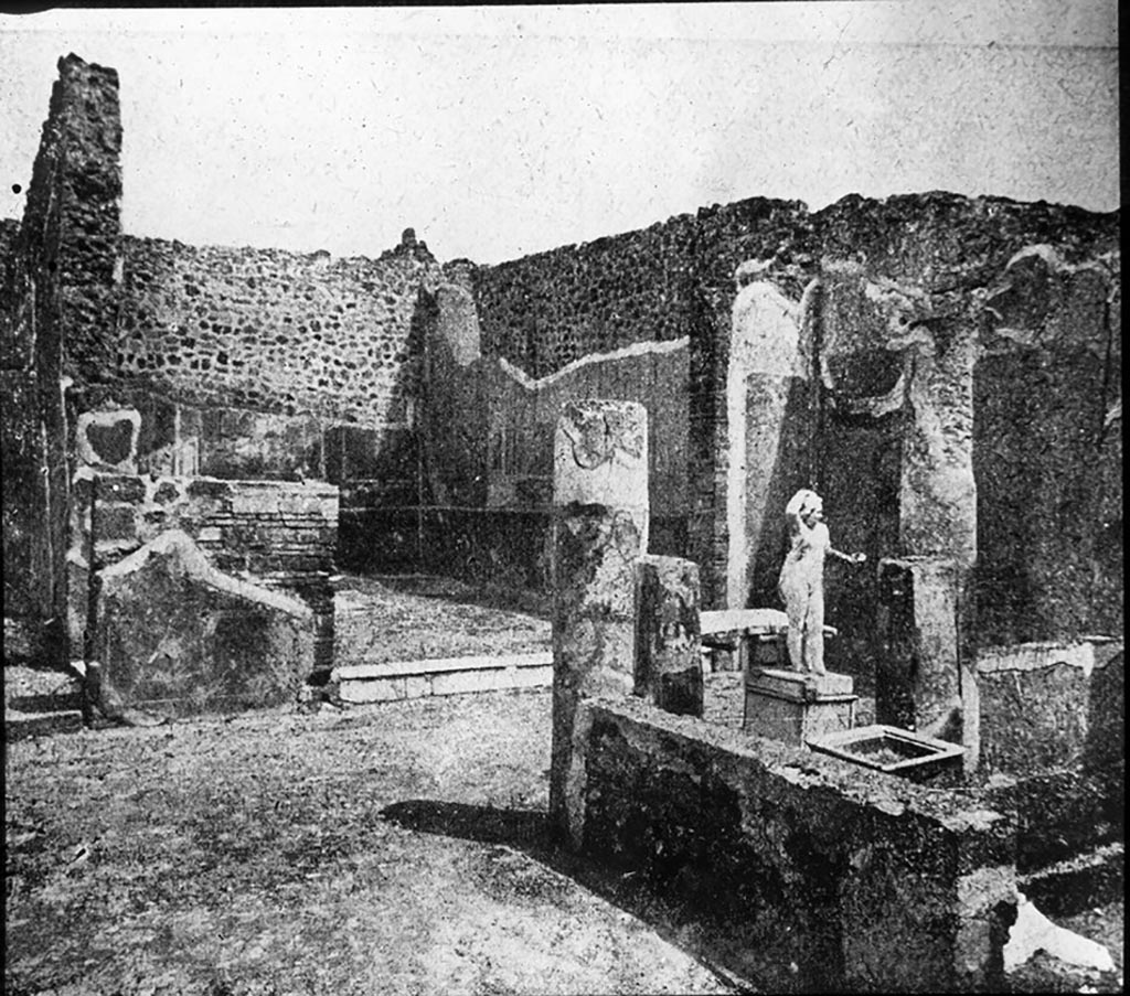 VII.12.28 Pompeii. Looking from west portico towards north portico and white marble threshold of the exedra, with painted decoration.
Photo by permission of the Institute of Archaeology, University of Oxford. File name instarchbx202im 005. Resource ID. 44501
See photo on University of Oxford HEIR database