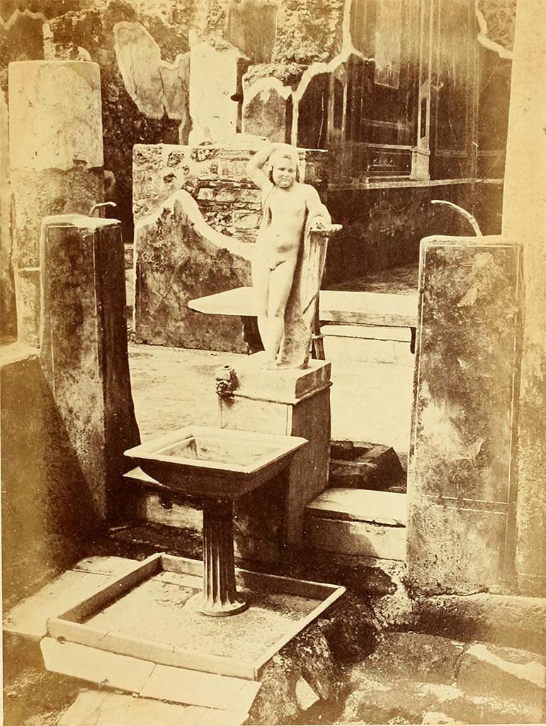 VII.12.28 Pompeii. 1867. Fountain and statue in Viridarium. 
See Dyer, T., 1867. The Ruins of Pompeii. London: Bell and Daldy, p. 25.