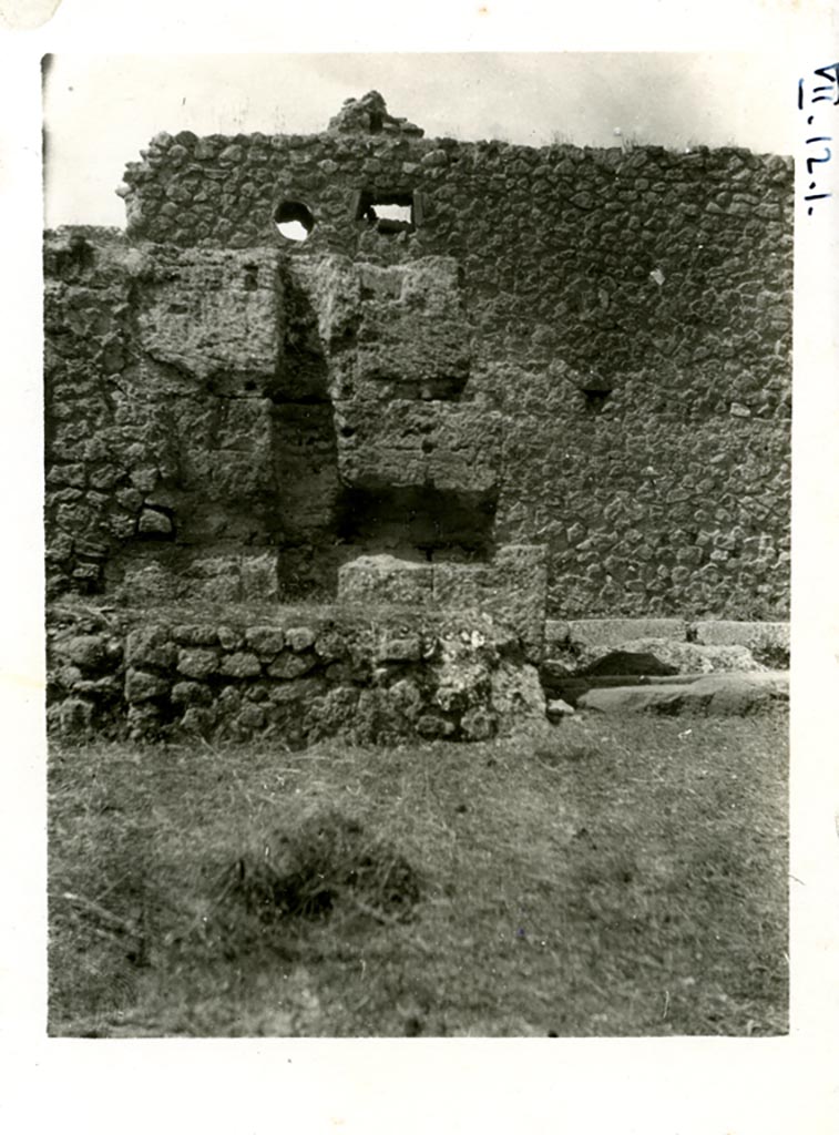 VII.12.1/37 Pompeii. Pre-1937-39. 
Looking west from VII.12.1 towards south side of doorway at VII.12.37 into Vicolo di Eumachia.
Photo courtesy of American Academy in Rome, Photographic Archive. Warsher collection no. 1836.