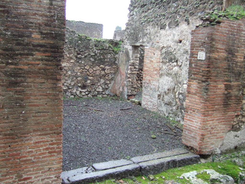 VII.13.23 Pompeii. December 2005. Looking south-east towards entrance doorway.