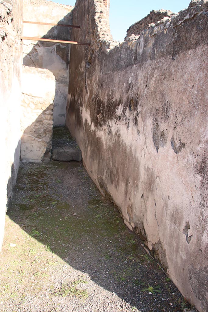 VII.14.4 Pompeii. October 2022. 
Looking north along site of stairs to upper floor, with latrine below. Photo courtesy of Klaus Heese.