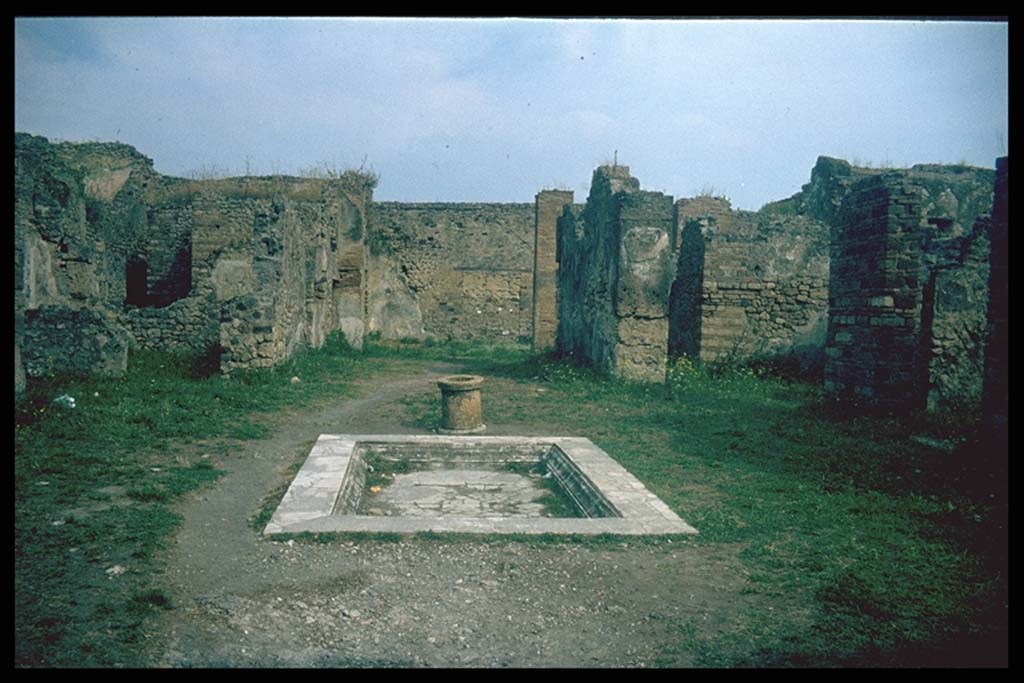 VII.14.9 Pompeii. Room 1, atrium and impluvium, looking north.
Photographed 1970-79 by Günther Einhorn, picture courtesy of his son Ralf Einhorn.