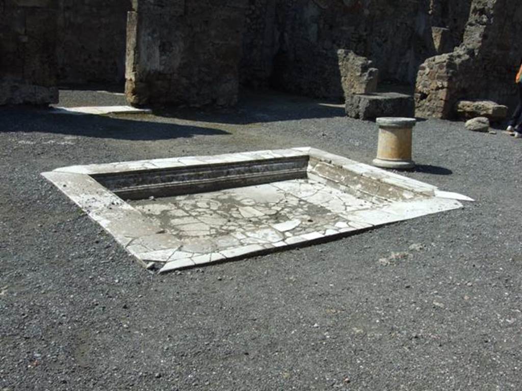 VII.14.9 Pompeii. March 2009. Room 1, looking north-west across impluvium in atrium.