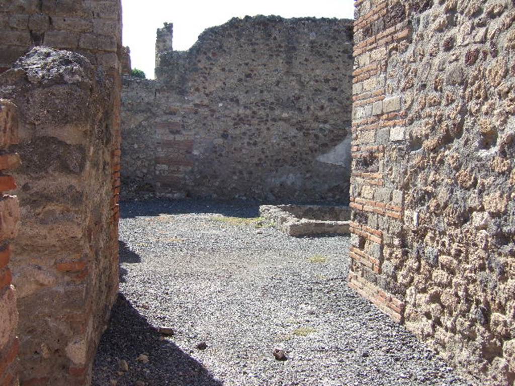 VII.14.15 Pompeii. September 2005. Looking west along fauces or entrance corridor towards atrium.