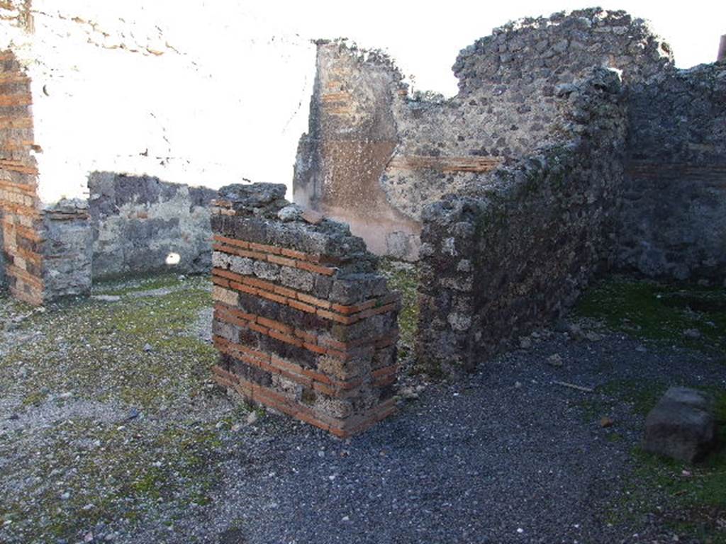 VII.14.15 Pompeii. December 2006. Looking east to two rooms in north-east corner. According to Eschebach, on the left would have been the triclinium, with the kitchen on the right.
See Eschebach, L., 1993. Gebäudeverzeichnis und Stadtplan der antiken Stadt Pompeji. Köln: Böhlau. (p.340)