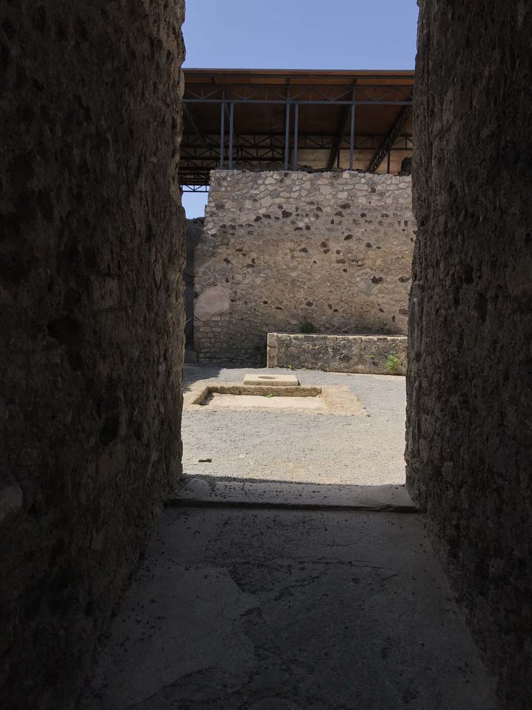 VII.15.1 Pompeii. April 2019. Looking north across atrium from entrance corridor/fauces.
Photo courtesy of Rick Bauer.