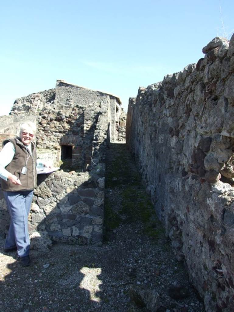 VII.15.2 Pompeii.  March 2009. Corridor to kitchen and baths area.