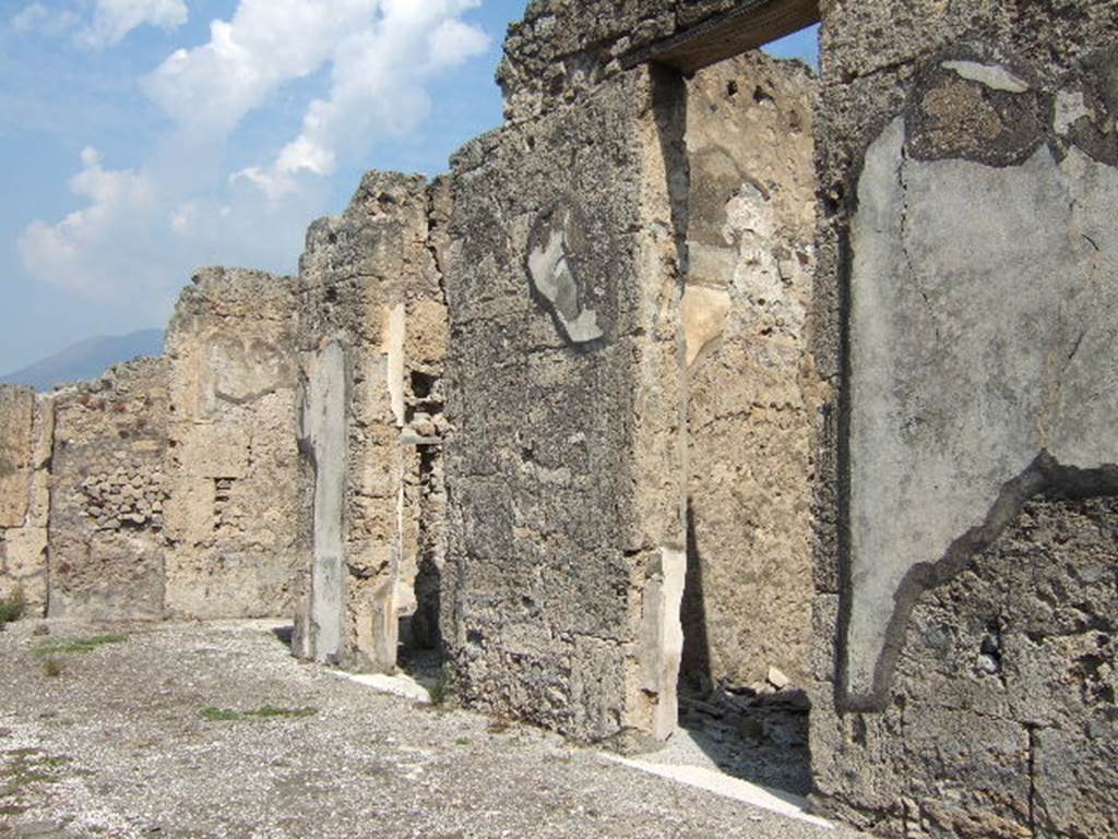 VII.15.2 Pompeii.  September 2005.  Doorways on east side of Atrium looking north.