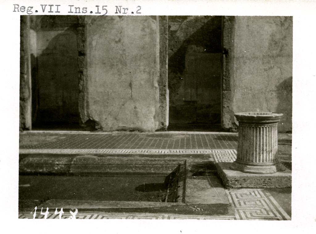 VII.15.2 Pompeii. Pre-1937-39. 
Looking east towards two doorways (cubiculum g, on left, and cubiculum f, on right) on east side of atrium.
Photo courtesy of American Academy in Rome, Photographic Archive. Warsher collection no. 1448.