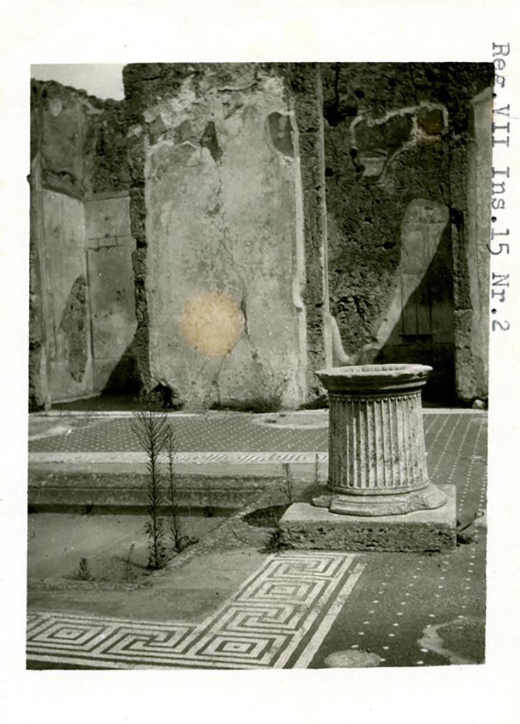 VII.15.2 Pompeii. Pre-1937-39. 
Looking east towards two doorways (cubiculum g, on left, and cubiculum f, on right) on east side of atrium.
Remains of panted decoration are visible.
Photo courtesy of American Academy in Rome, Photographic Archive. Warsher collection no. 444.
