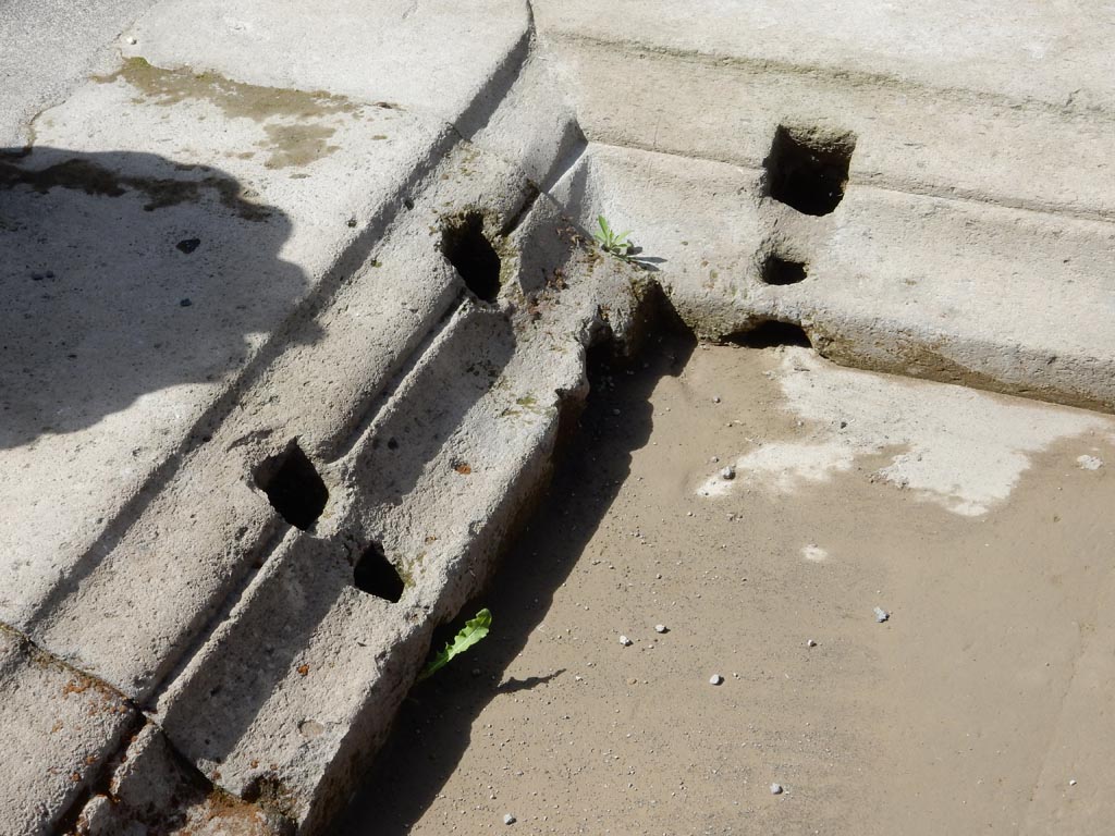 VII.15.2 Pompeii. May 2018. Detail of south-west corner of impluvium in atrium. Photo courtesy of Buzz Ferebee.