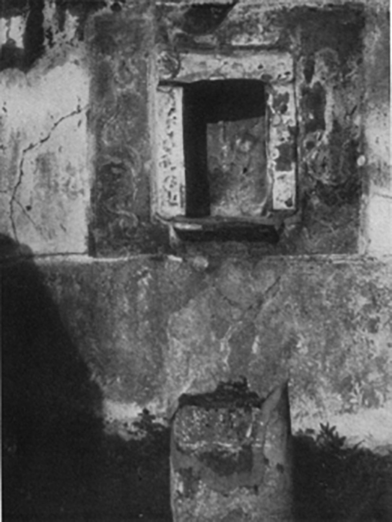 VII.15.5 Pompeii, 1930s photo by Tatiana Warscher. Looking towards niche on north wall of garden area.
See Boyce G. K., 1937. Corpus of the Lararia of Pompeii. Rome: MAAR 14.  (p. 72, no.330, plate 12,3).