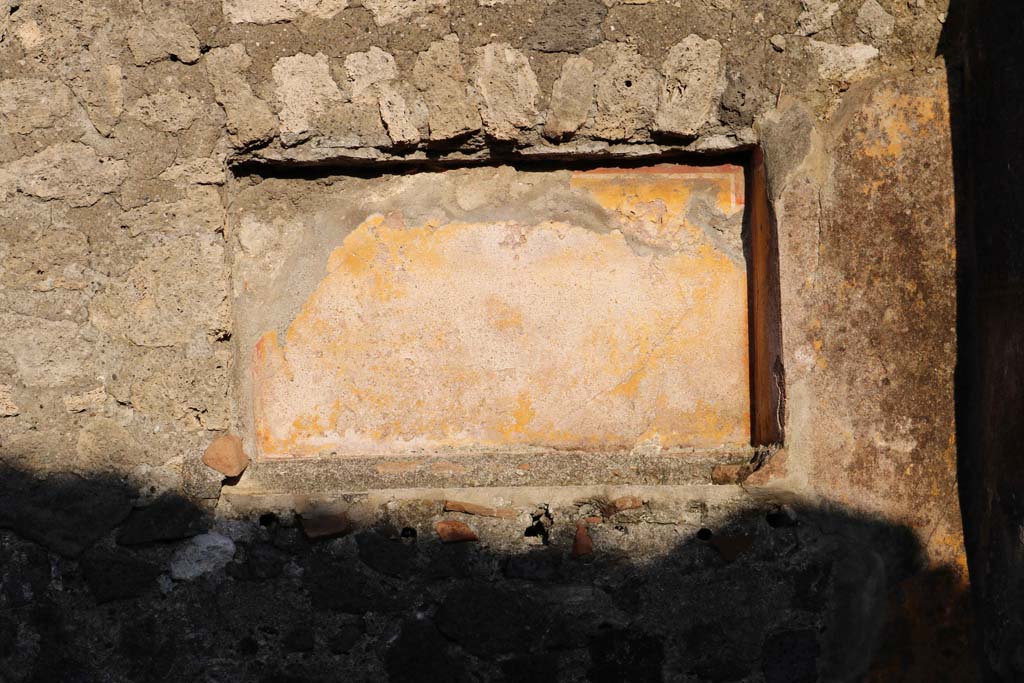 VII.15.12 Pompeii. December 2018. 
Shallow rectangular niche in east wall of atrium, as described by Boyce, above, or triclinium. Photo courtesy of Aude Durand.