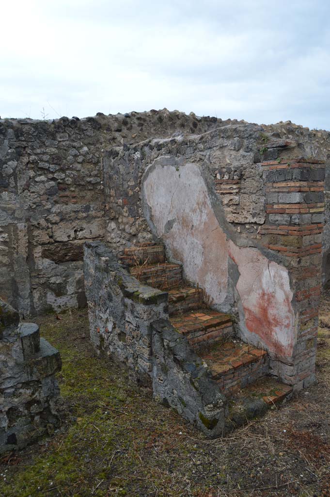VII.15.12/11 Pompeii. March 2018. 
Looking north-west to steps to upper floor, from garden area.
Foto Taylor Lauritsen, ERC Grant 681269 DÉCOR.