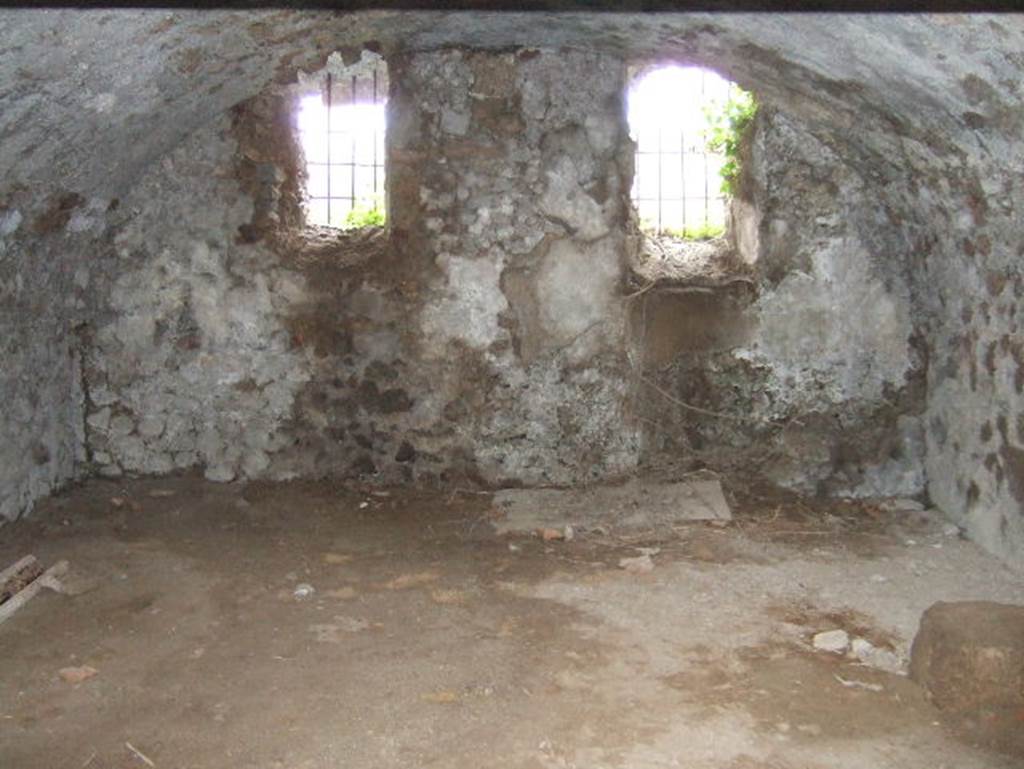 VII.15.16 Pompeii. May 2006. Room K, looking towards west wall with two windows onto garden area.